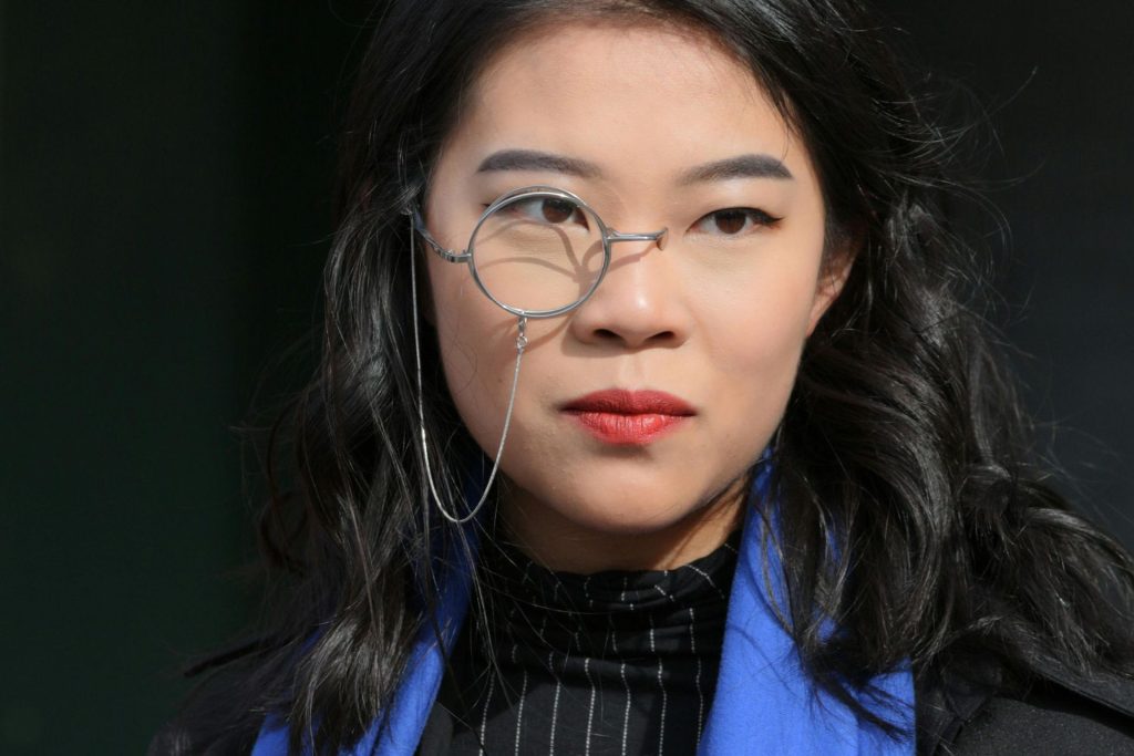 Woman wearing monocle