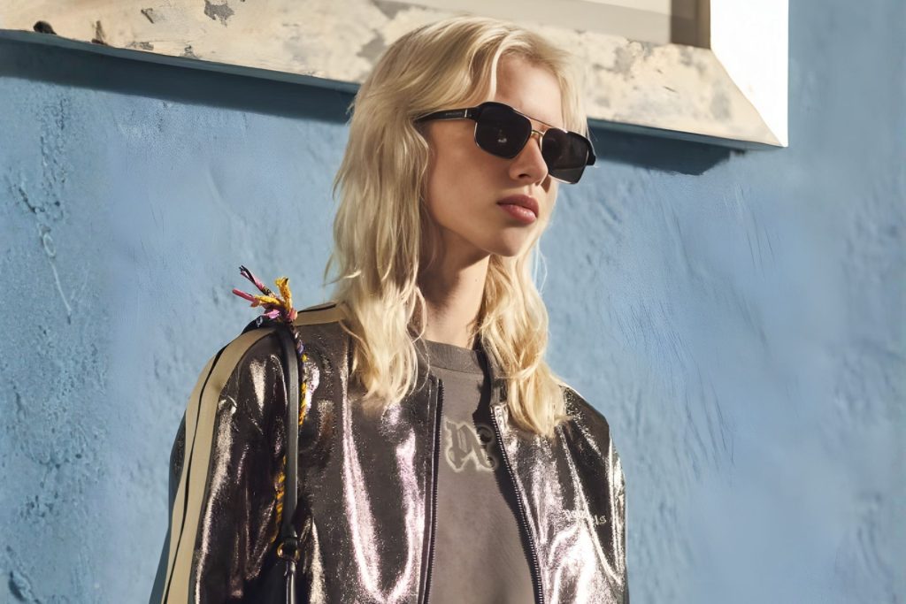 Model wearing square Palm Angels sunglasses and streetwear