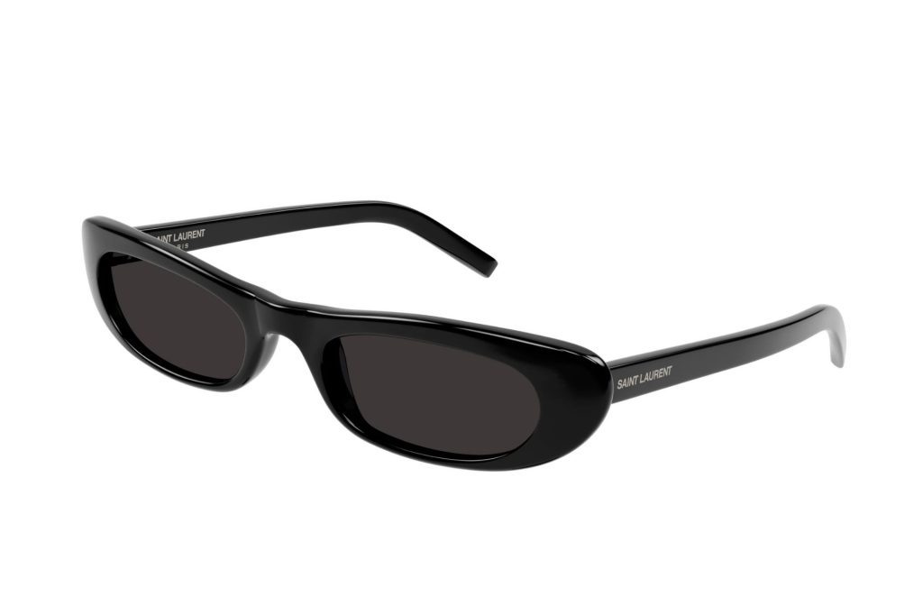 Saint Laurent SL 557 SHADE sunglasses featuring black frames and lenses