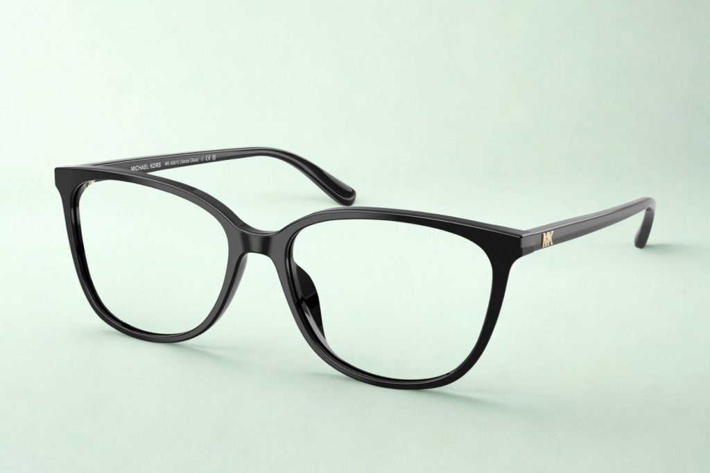 Thick black acetate frames with the MK logo near the hinges