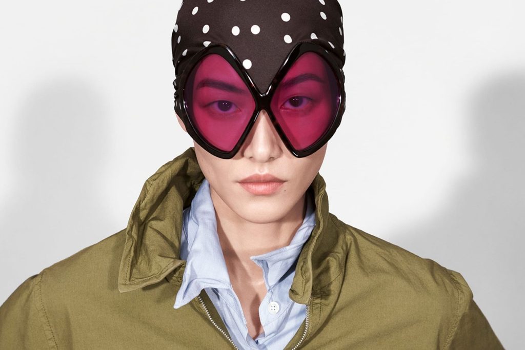 Model wearing Prada oversized bug-eye sunglasses