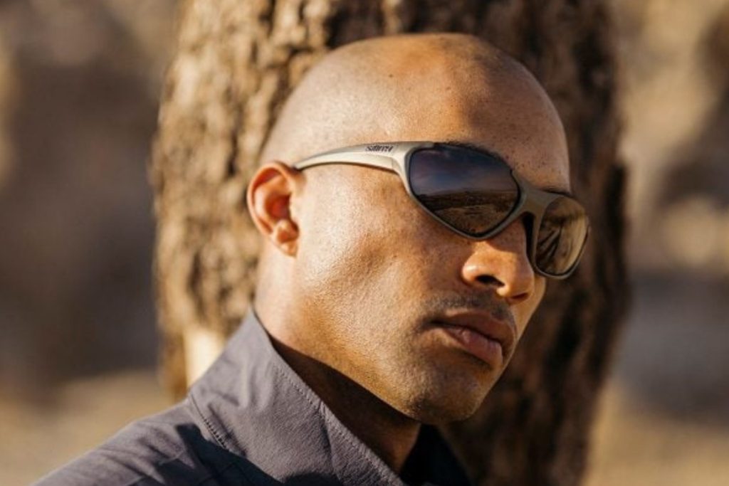 Model wearing Smith Optics 2026 sunglasses
