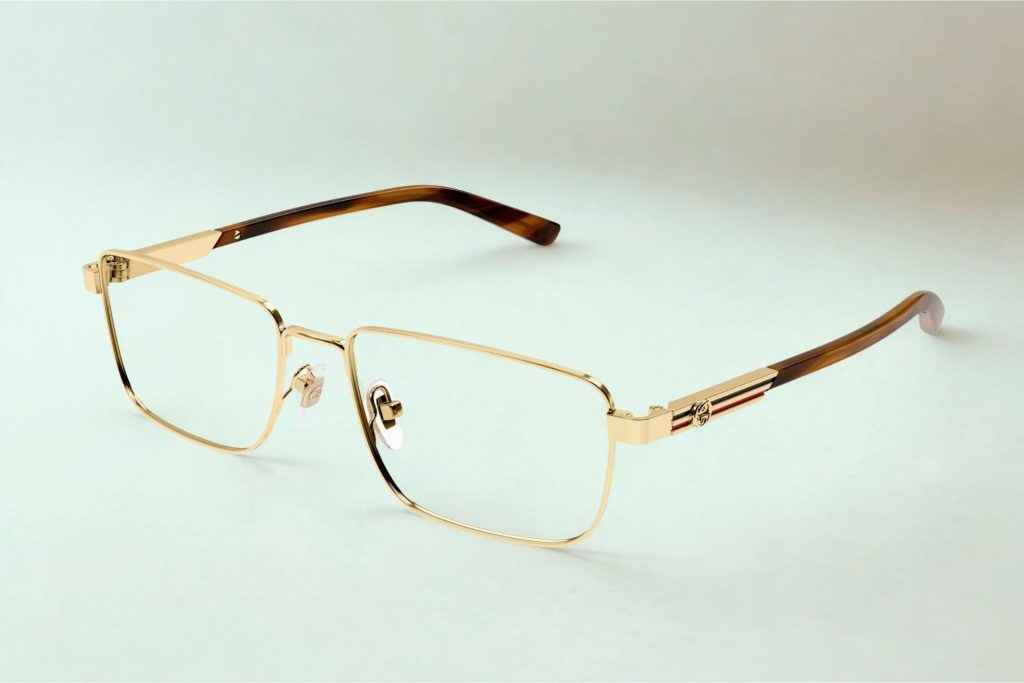Gucci GG1291O glasses featuring a gold rectangular frame