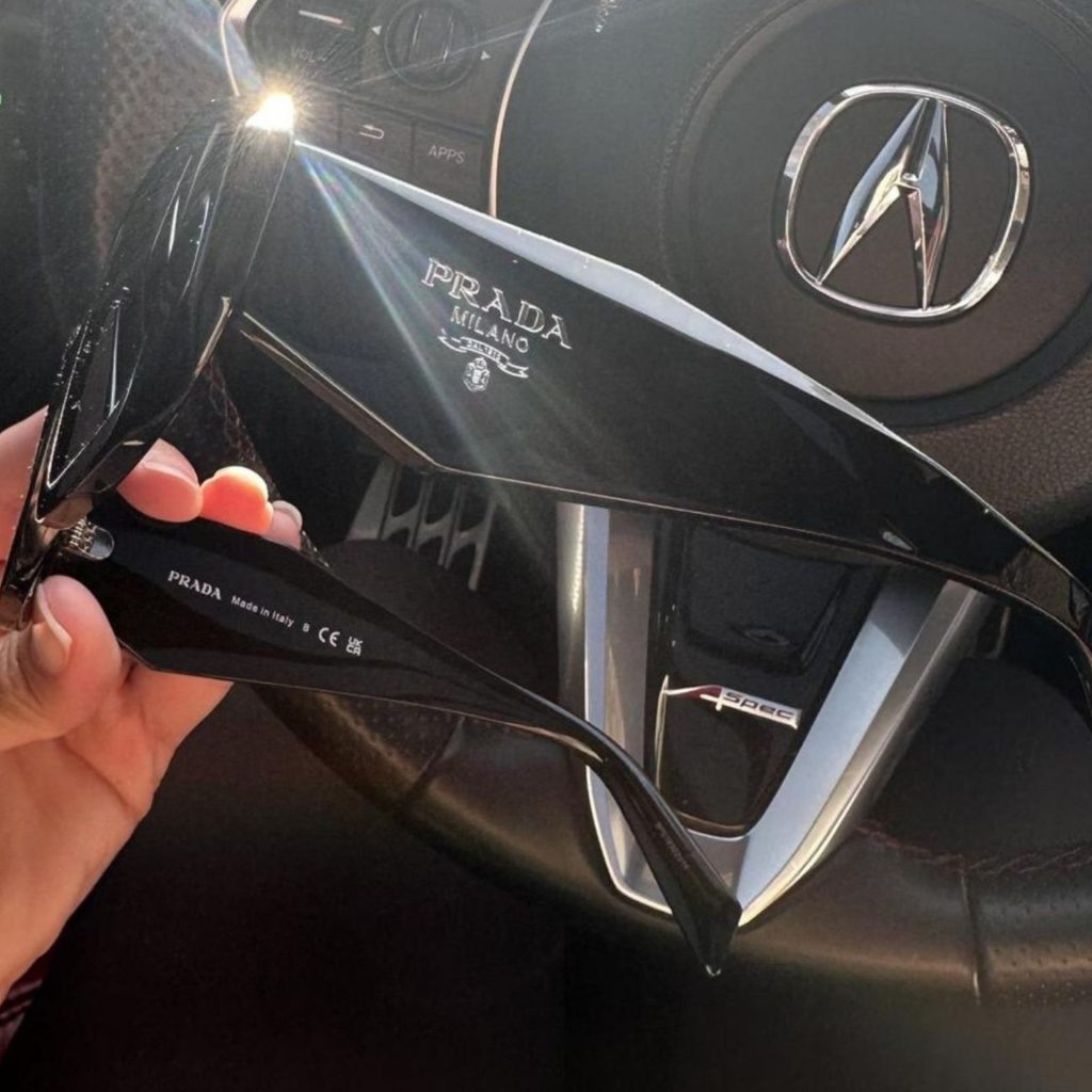 Prada PR 17WS sunglasses featuring black frames