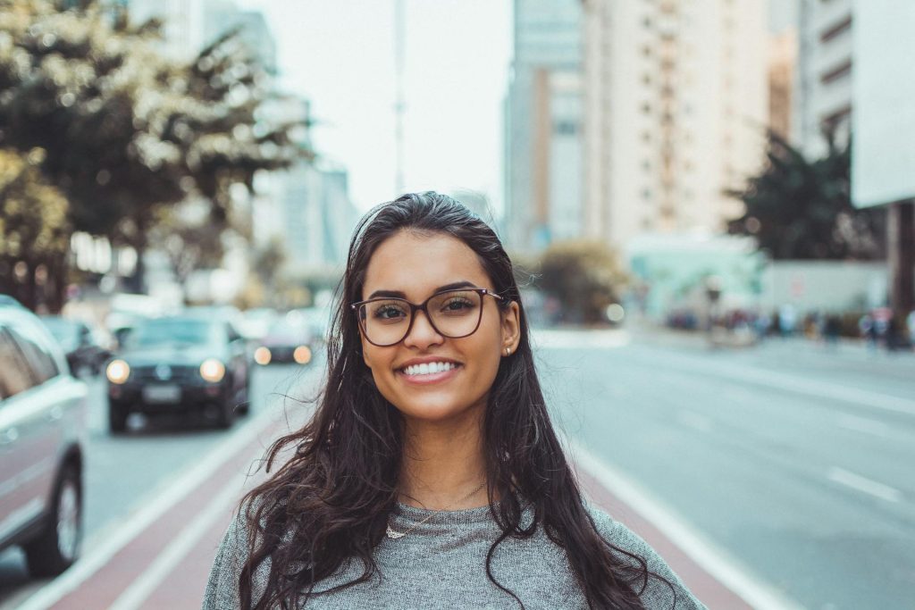 Woman with glasses on street