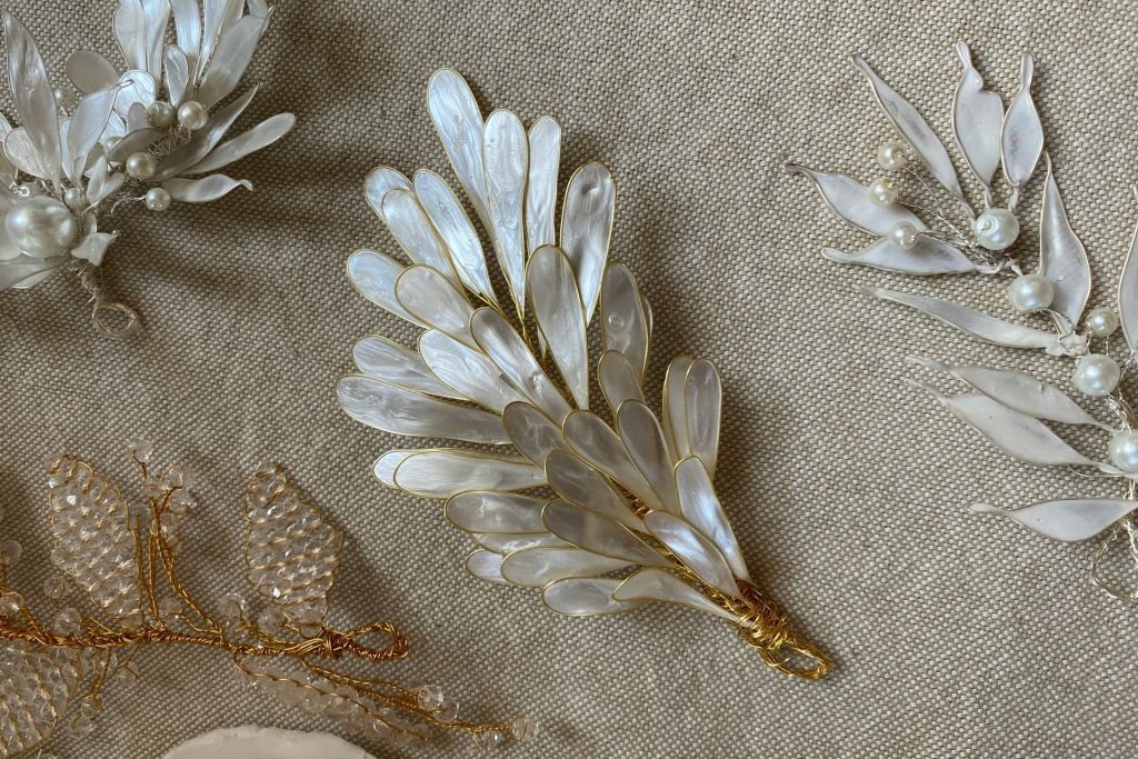 Silver and pearl brooches
