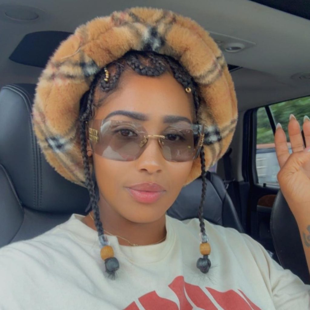 Customer wears Miu Miu MU 54YS sunglasses