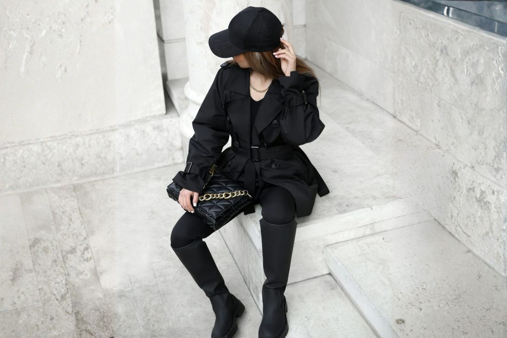 Woman wearing a head-to-toe black outfit