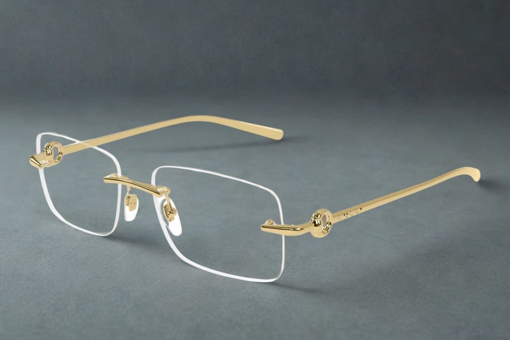 Gucci GG1703O rimless glasses featuring gold arms