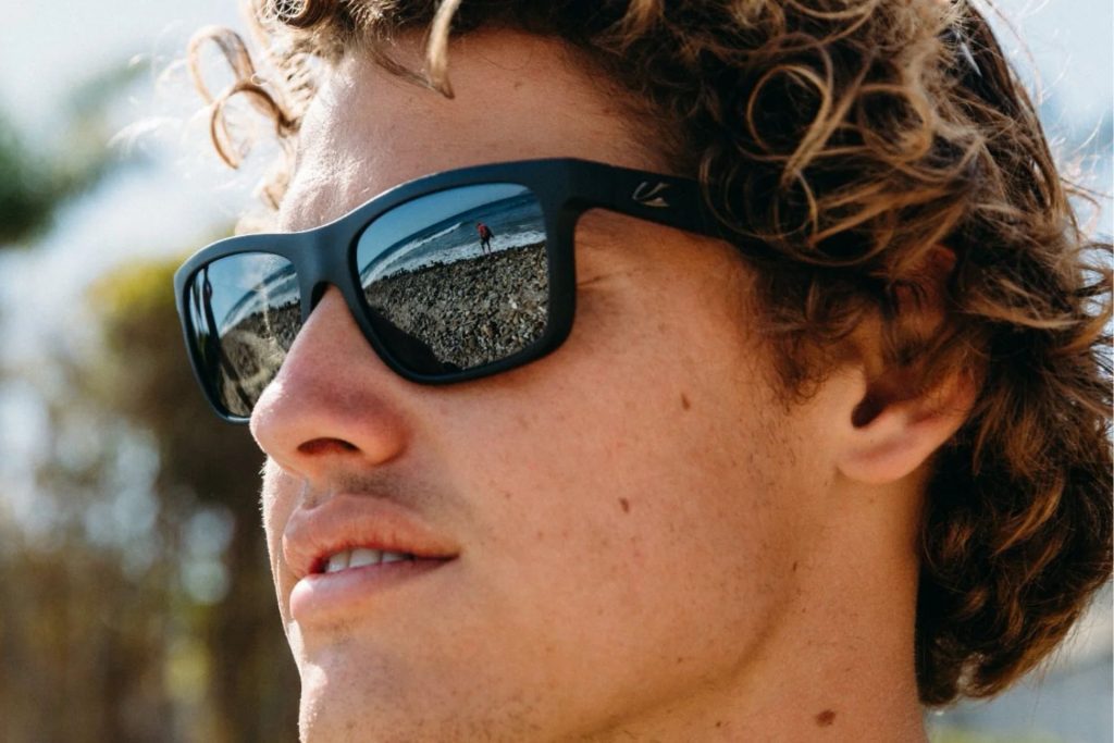 Man wearing black Kaenon sunglasses
