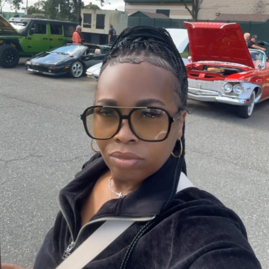 Customer wears Saint Laurent SL 545 sunglasses