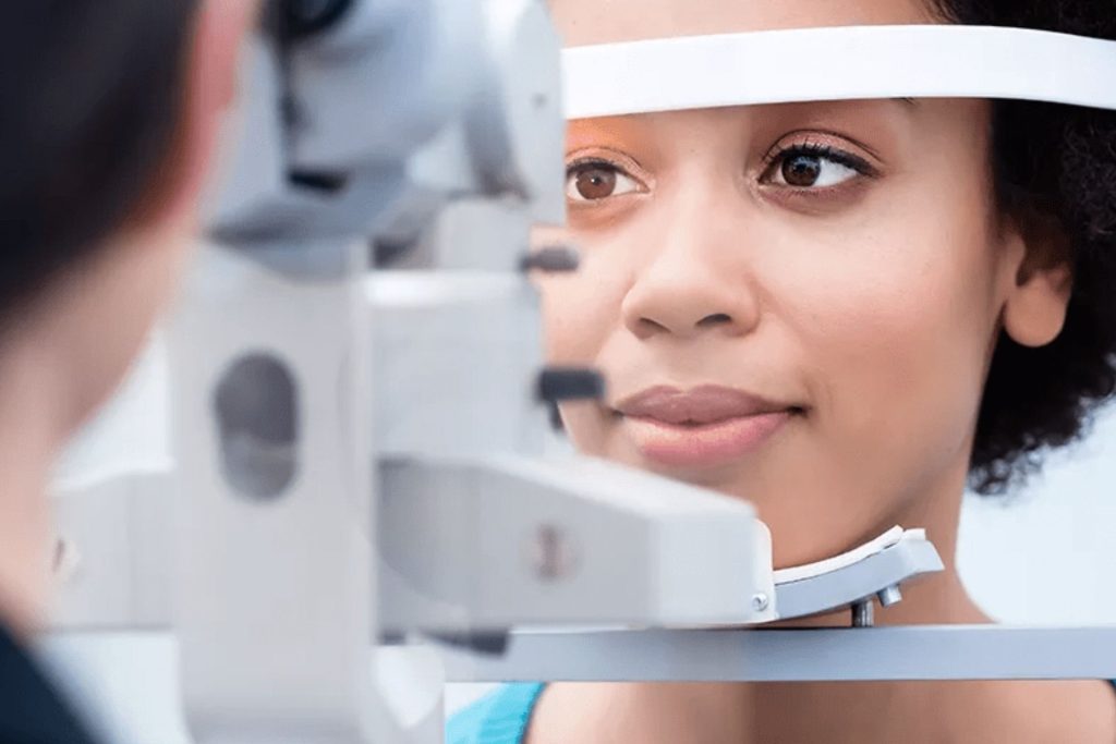 Woman getting eye exam
