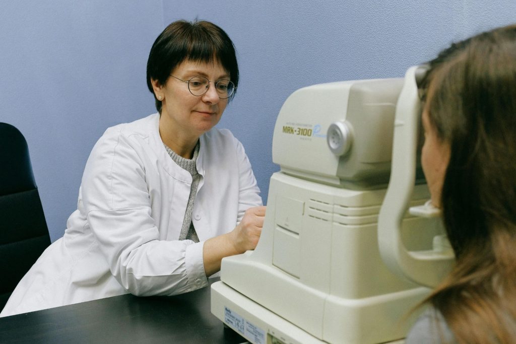 Eye doctor conducting an eye exam
