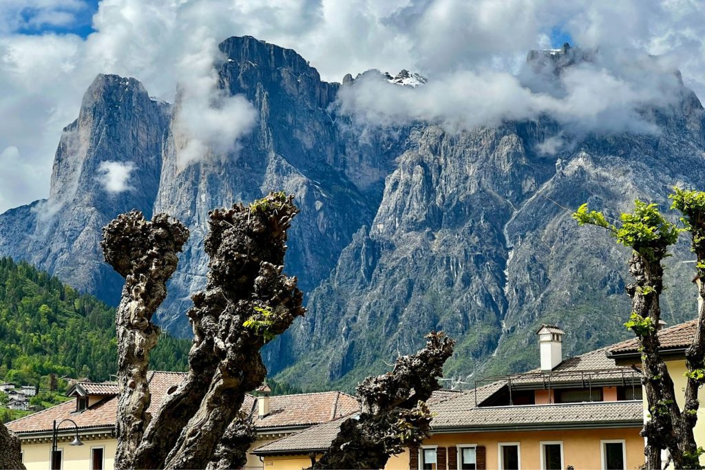 Mountains and tops of houses in Agordo, Italy
