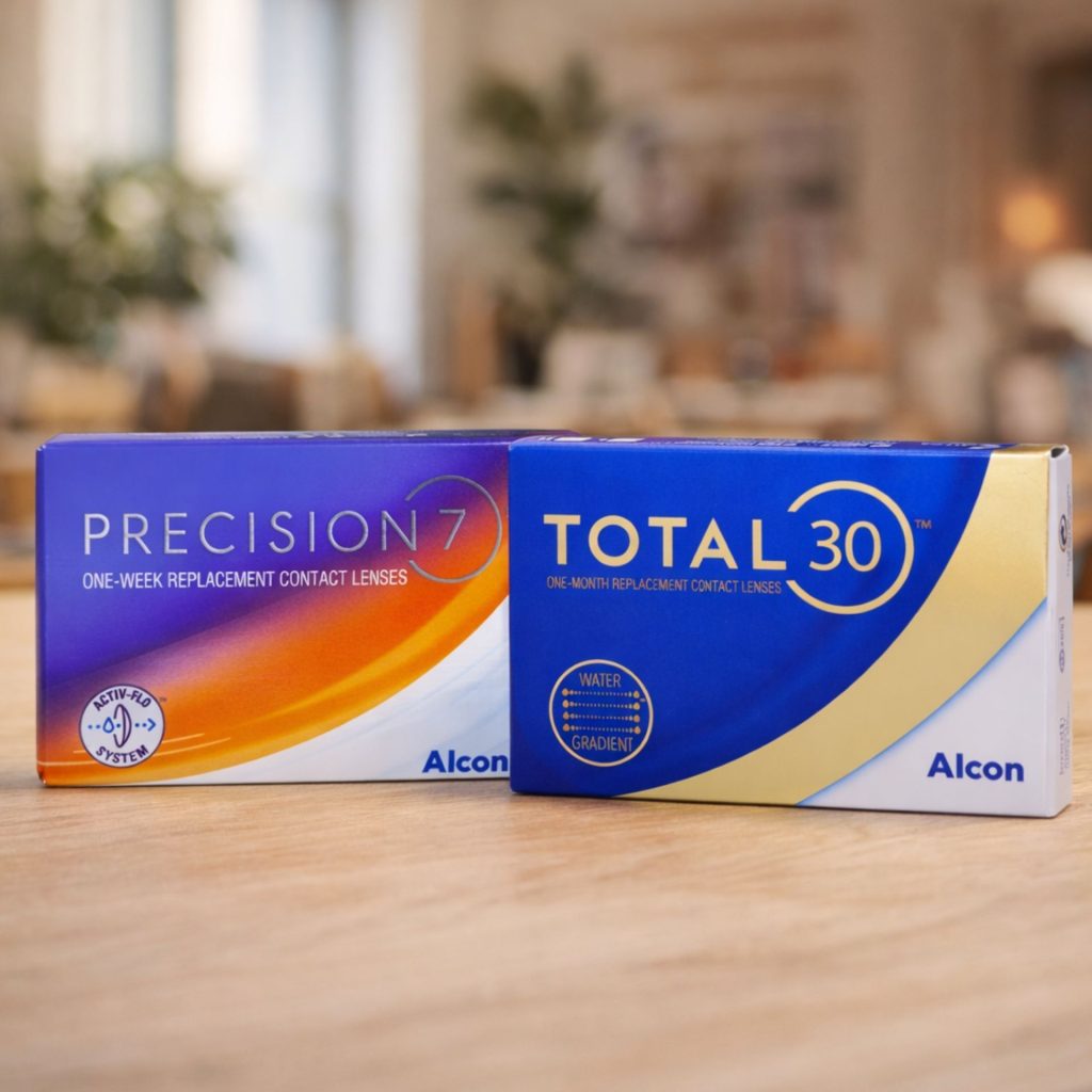 TOTAL30 and PRECISION7 contact lenses on a table