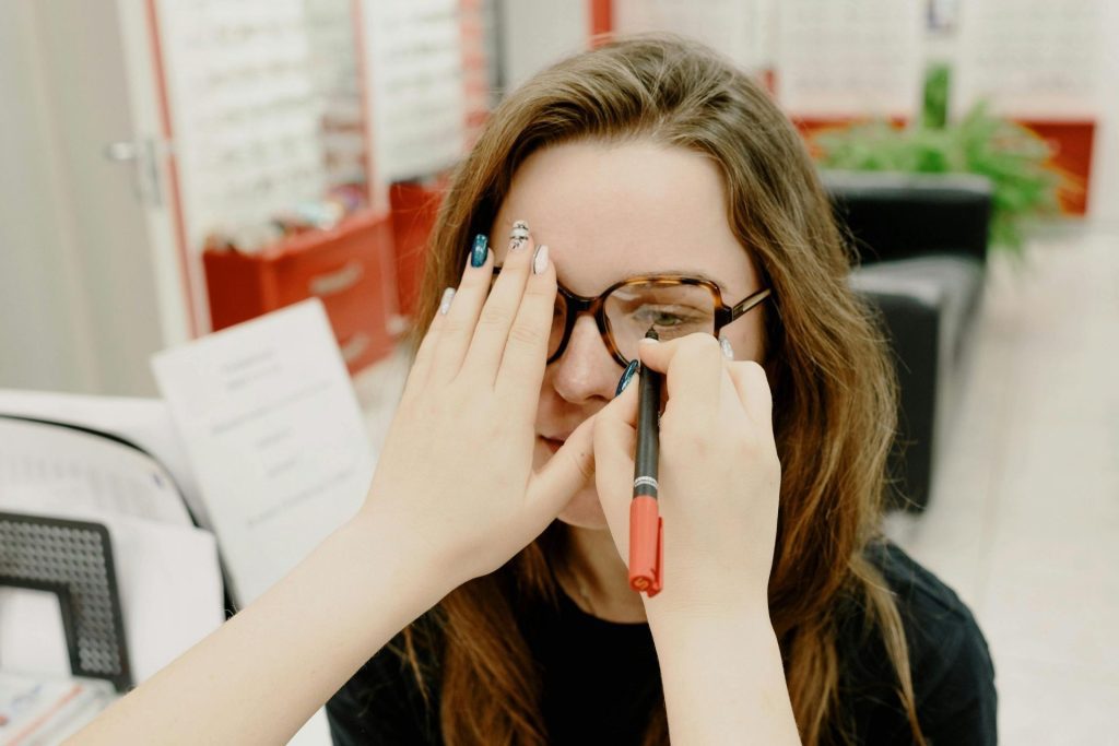 Woman being fitted for glasses