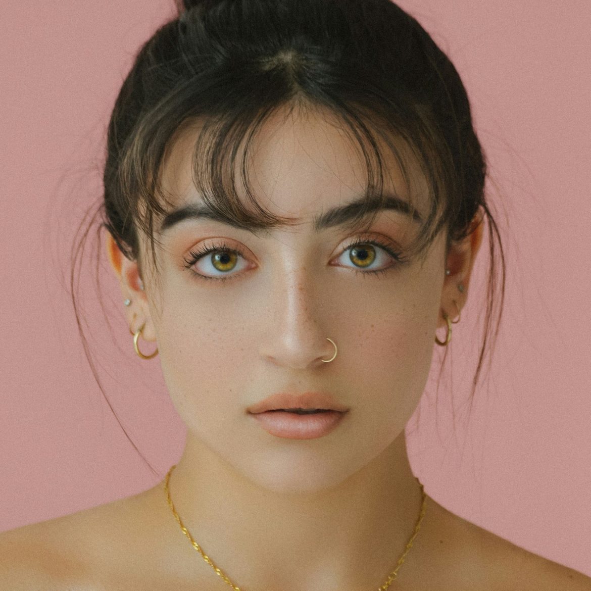 Woman with brown eyes and different eye shapes