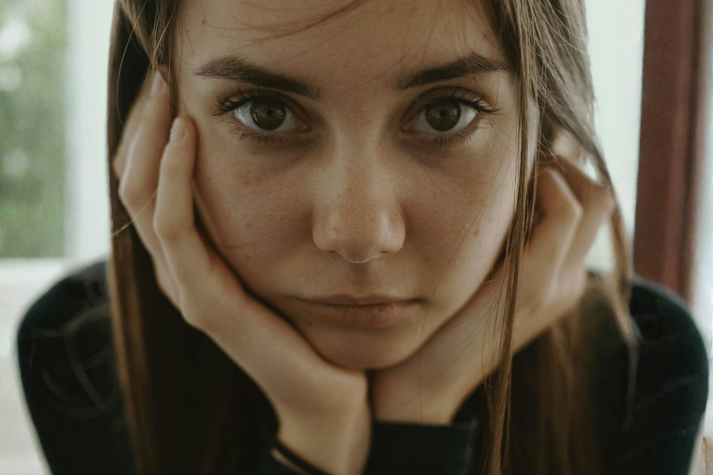 Girl with brown eyes looking into the camera