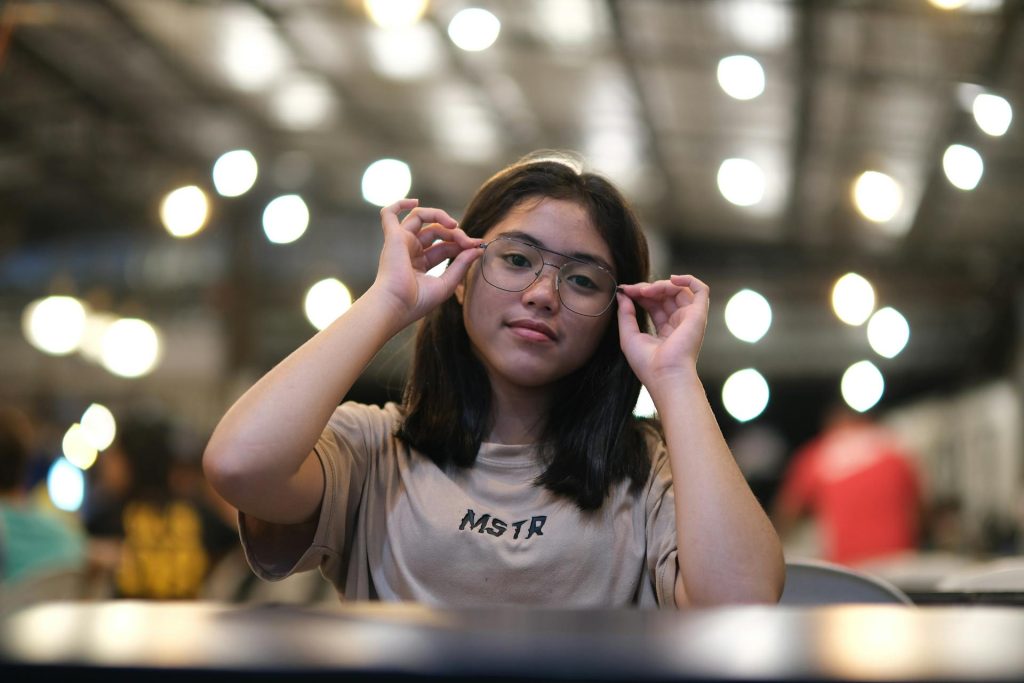 Woman tries on glasses