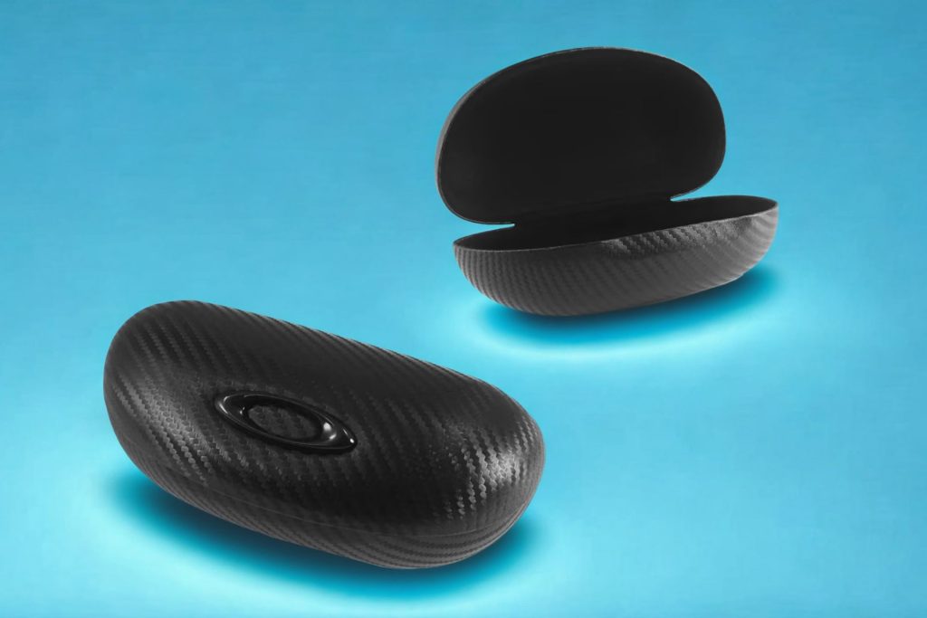 Oakley Large Ellipse O case on a blue background