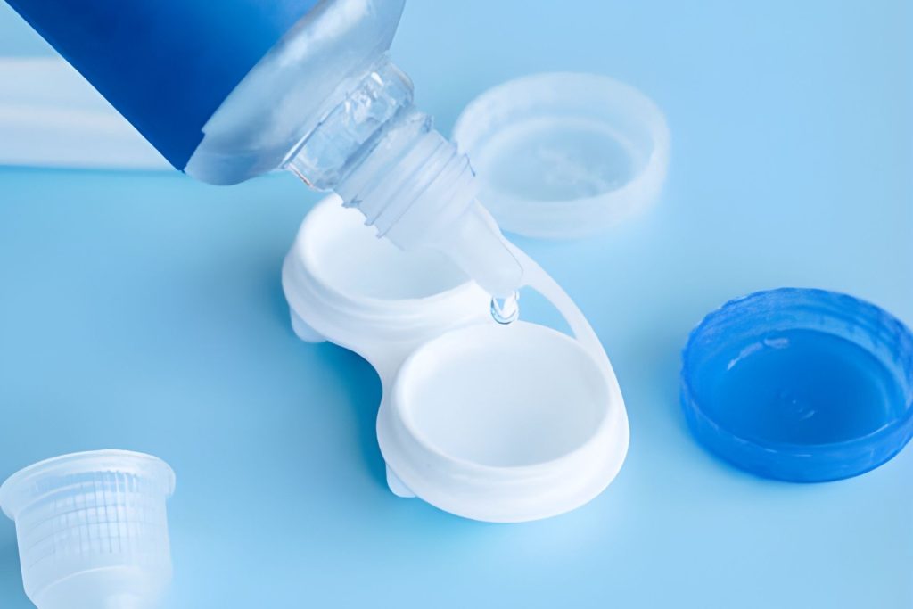 A contact lens case being filled with contact solution