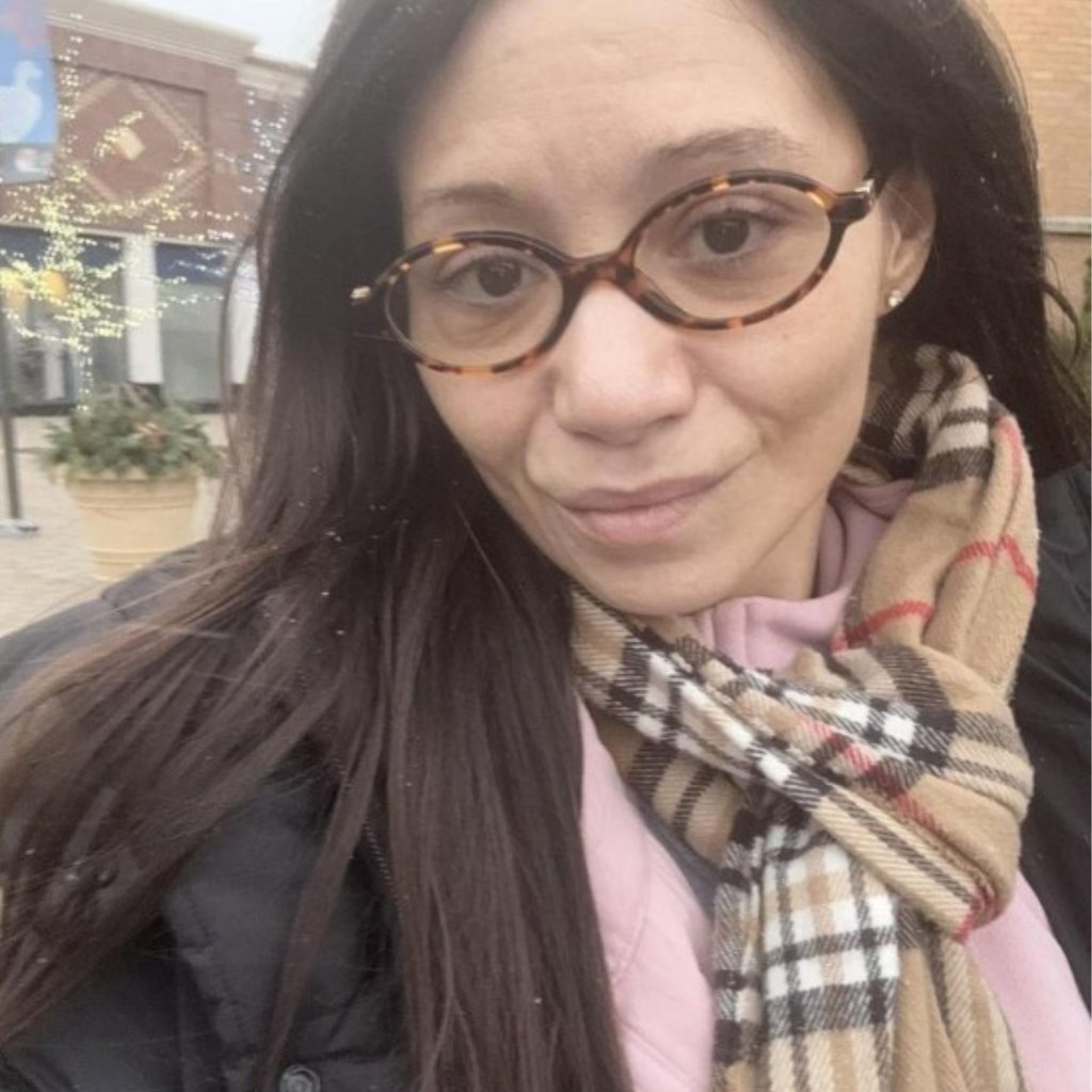 Customer wearing Miu Miu MU 01XV glasses