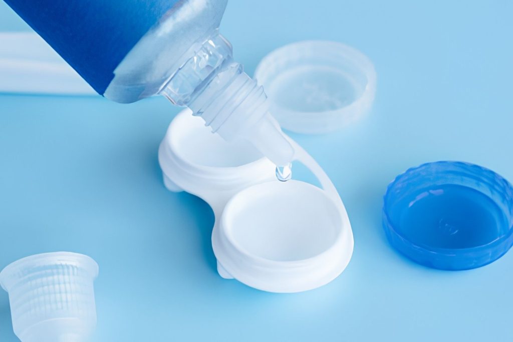 Contact lens case being filled with contact solution