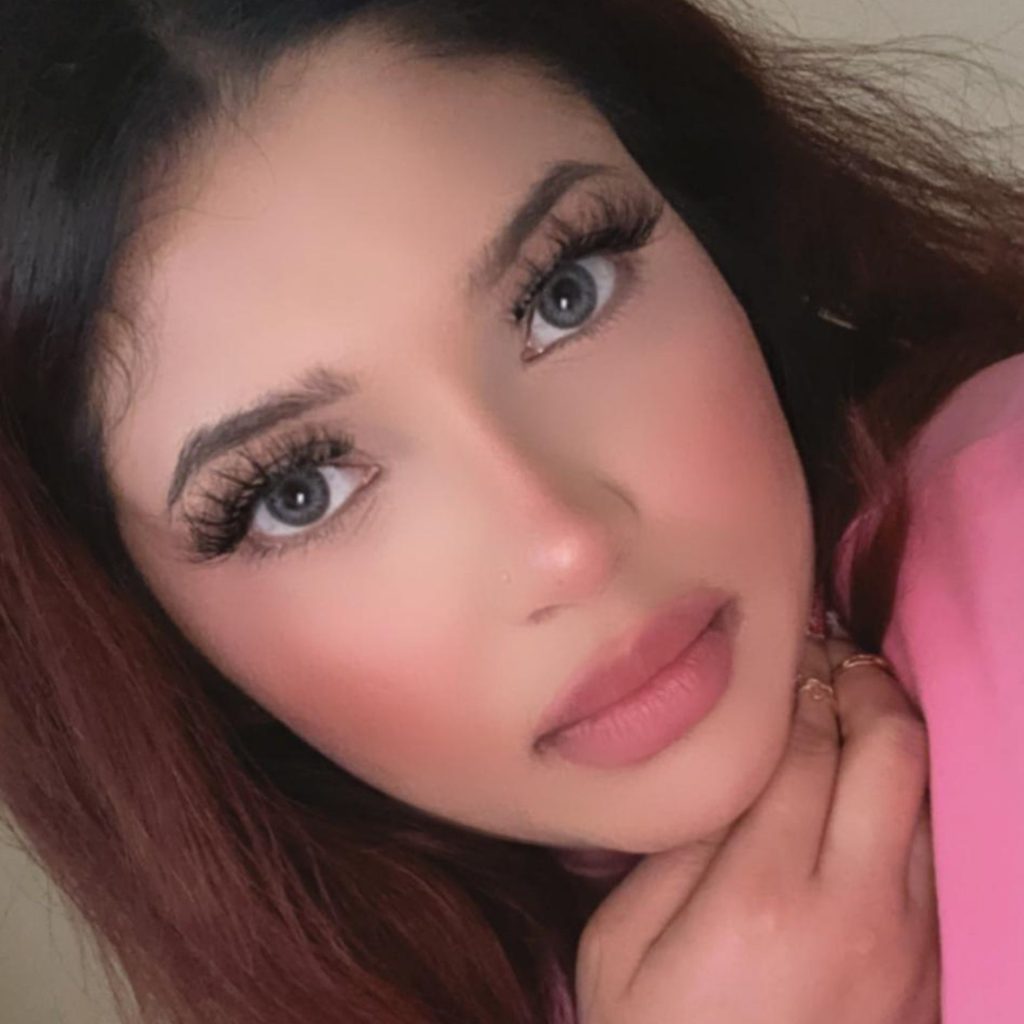 Woman wearing gray contact lenses
