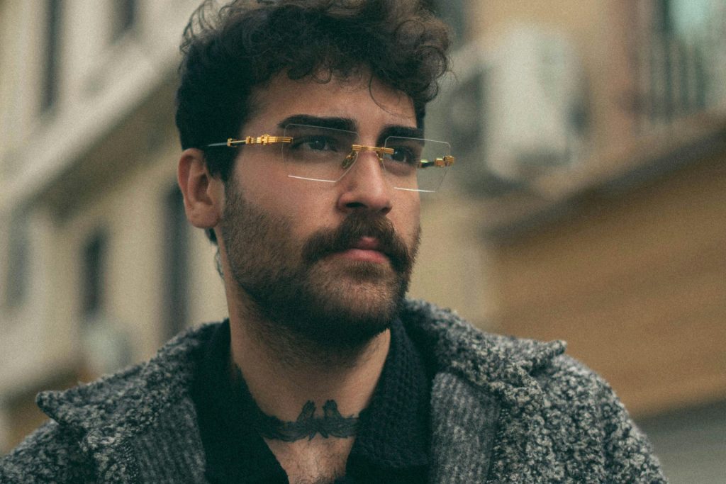 Man wearing rimless eyeglasses