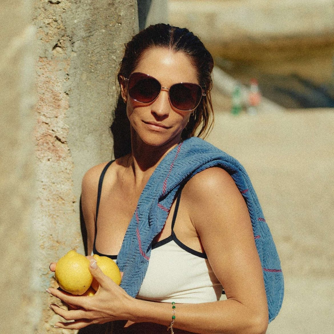 Woman wearing oversized Salt Optics sunglasses
