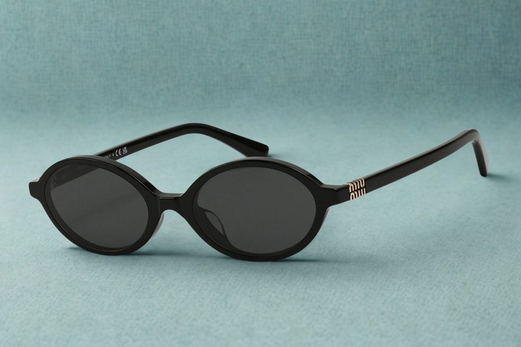 Miu Miu MU 04ZSF black oval sunglasses