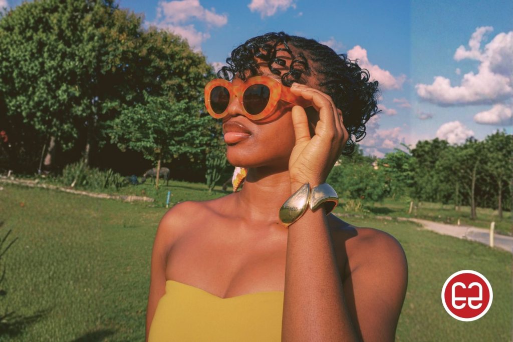 Woman wearing printed sunglasses