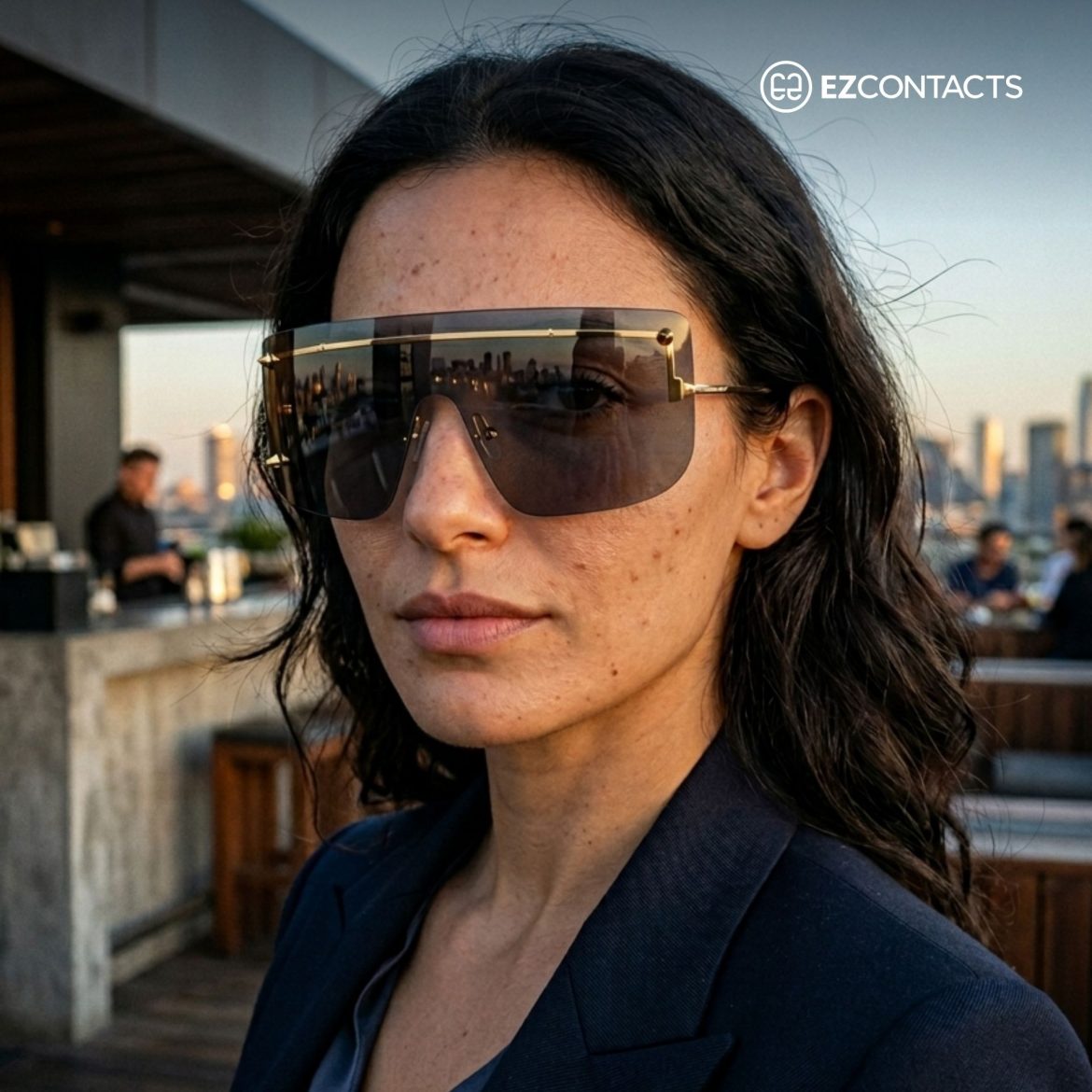 Woman wearing Alexander McQueen sunglasses