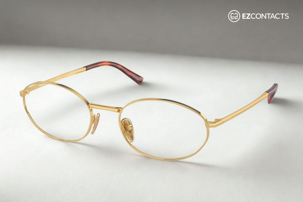 Prada PR A57V oval glasses featuring gold frames