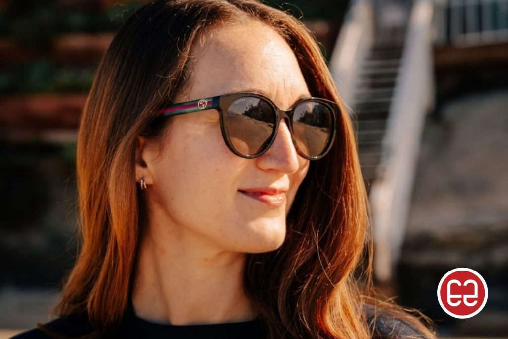 Woman wearing Gucci sunglasses in the sun