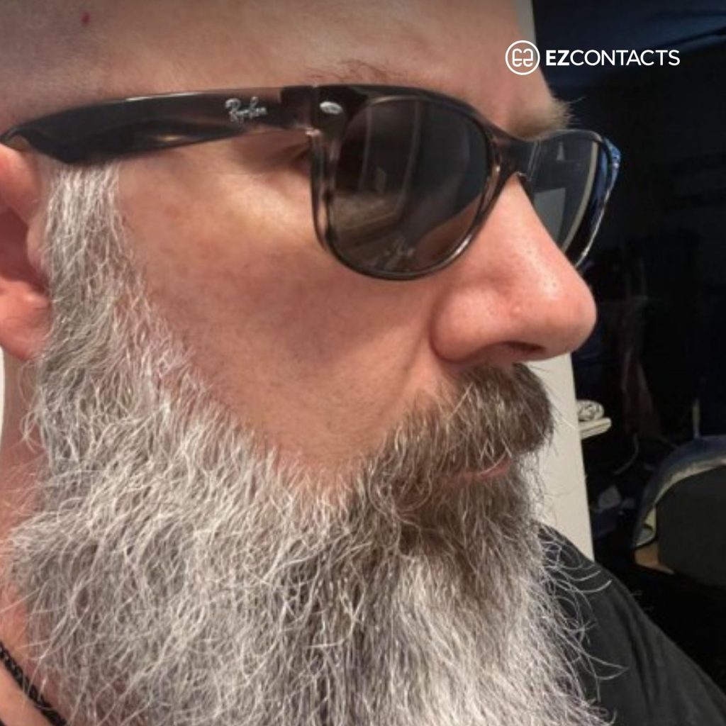 EZContacts customer wears Havana Ray-Ban RB2132 New Wayfarer sunglasses