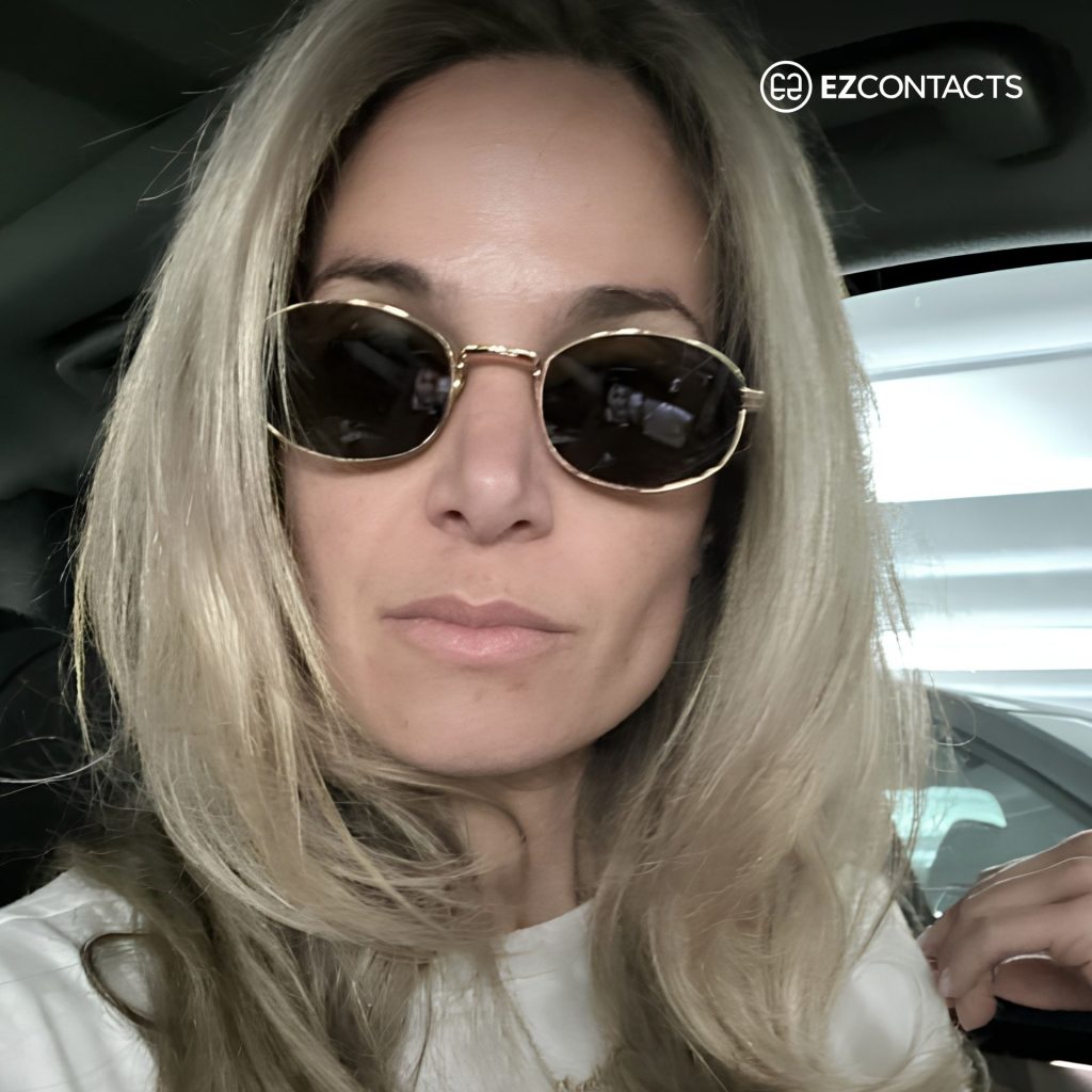 EZContacts customer wears Prada PR B53S sunglasses