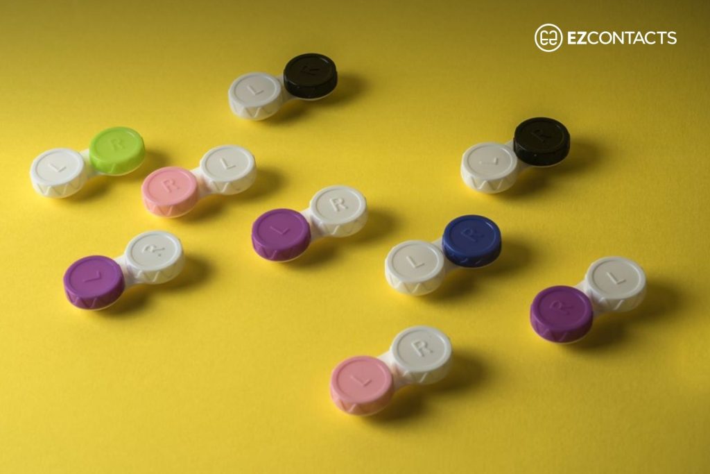 Contact lens cases on a yellow background