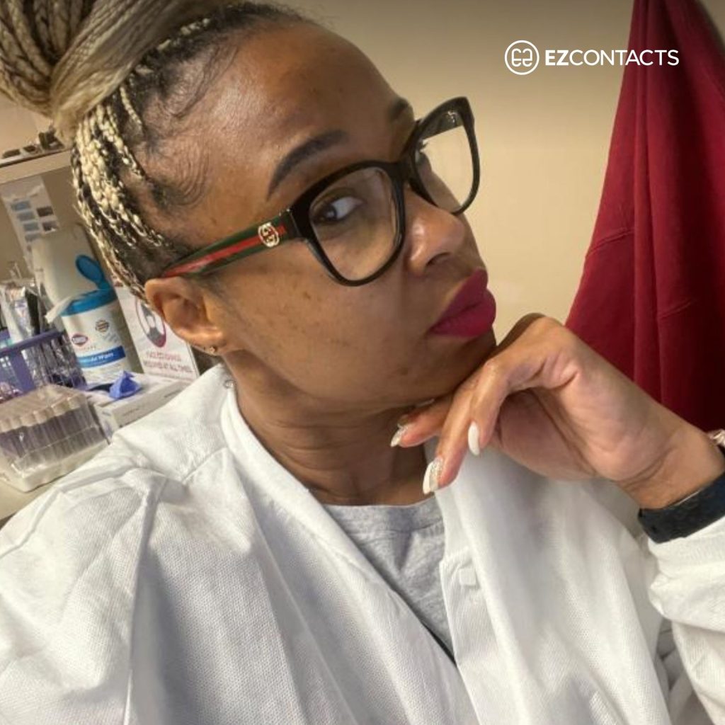 Woman wearing Gucci glasses in scrubs