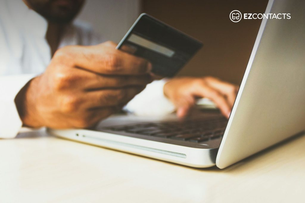 Person putting in credit card information