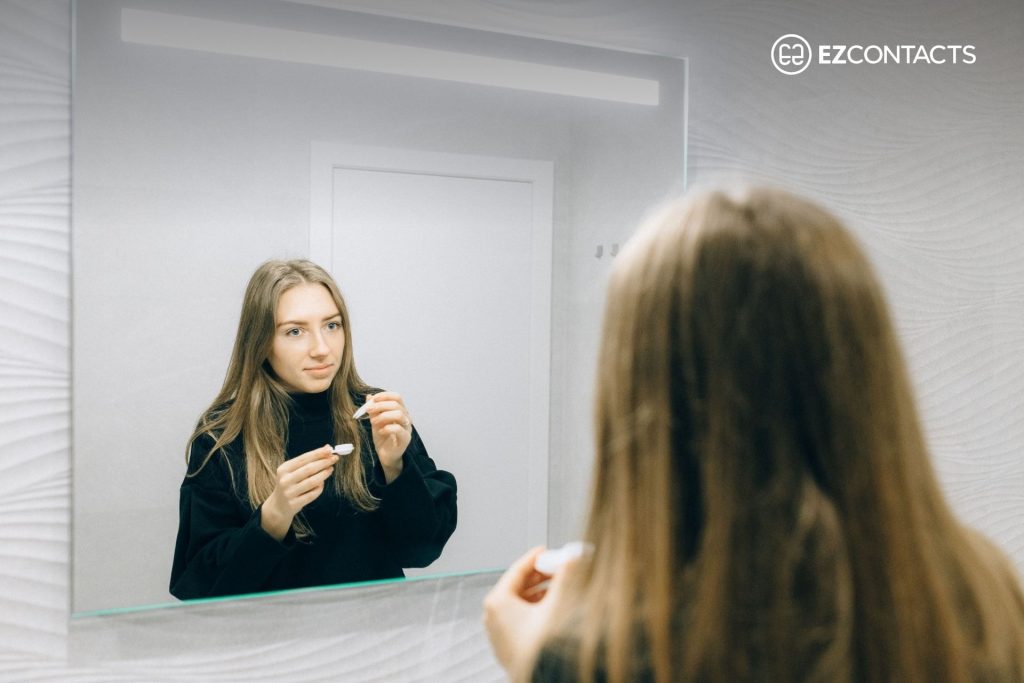 Woman putting in a contact