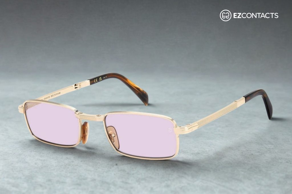 The DB 99/ORIGAMI in gold brown horn with violet/gray photochromatic lenses