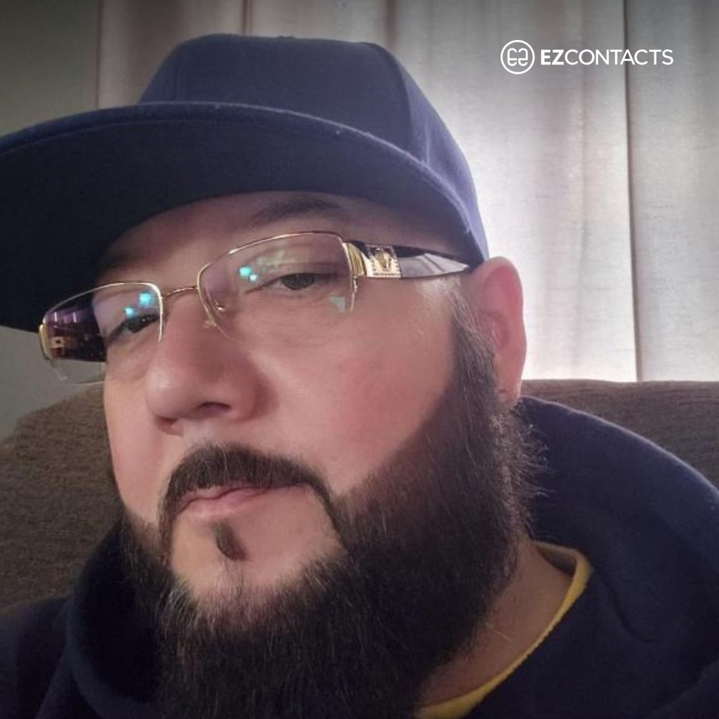Man wearing hat and Versace VE1175B glasses