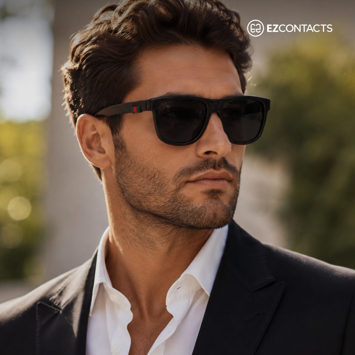 Man wearing Gucci GG0010S sunglasses