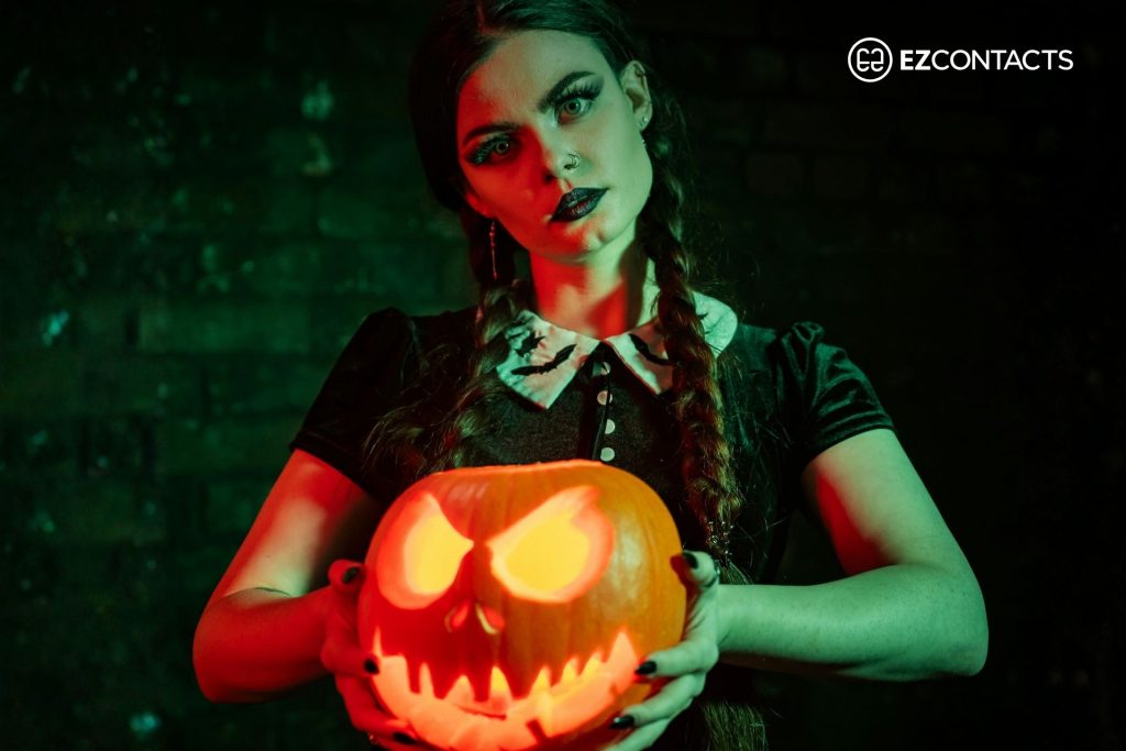 Woman in Wednesday Addams Halloween costume