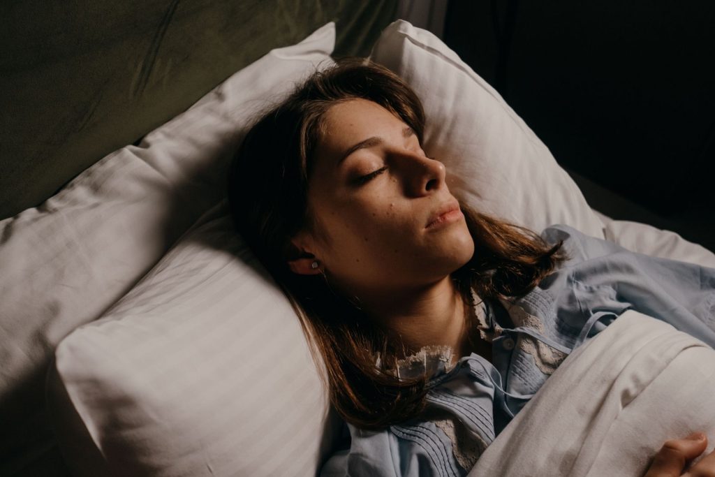 Woman sleeping in bed