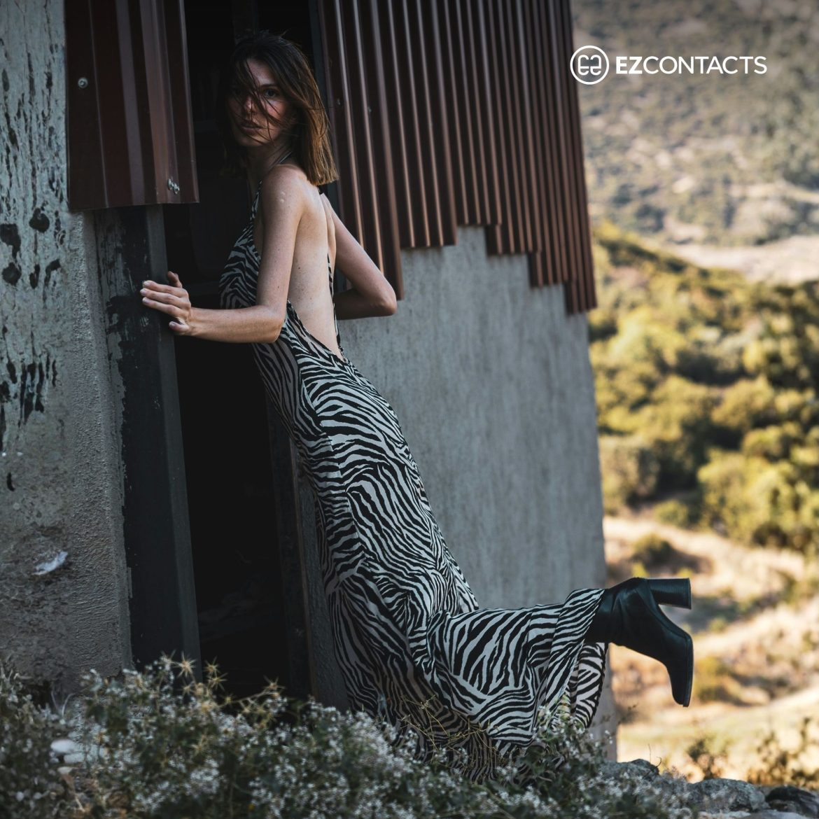 Woman wearing zebra print dress