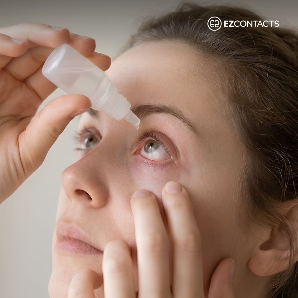 Woman putting in eye drops